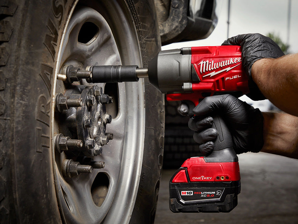 Milwaukee Automotive M18 FUEL 1/2" Ext. Anvil Controlled Torque Impact Wrench  used on a tire.